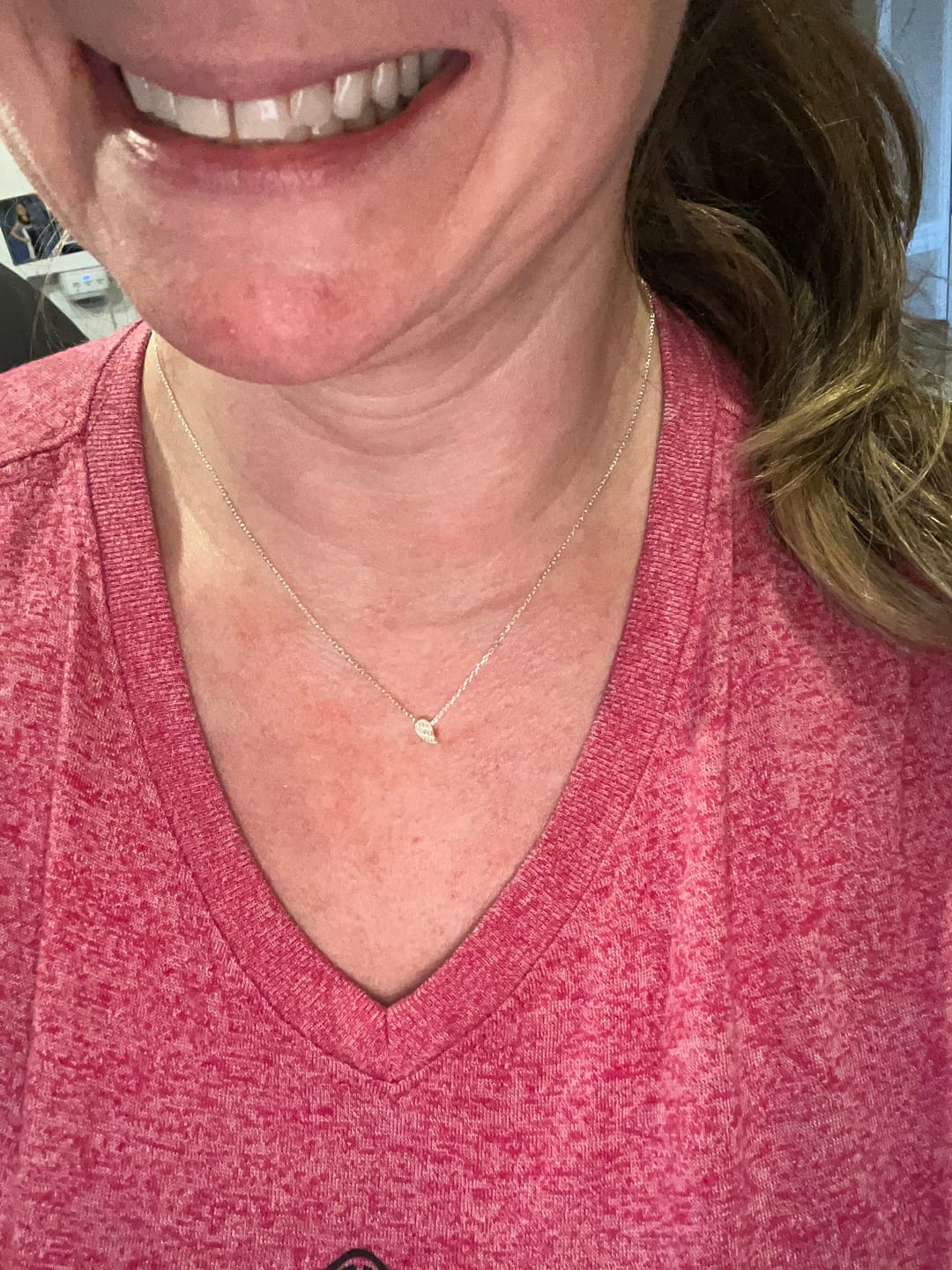 Customer photo review of always near angel wing necklace