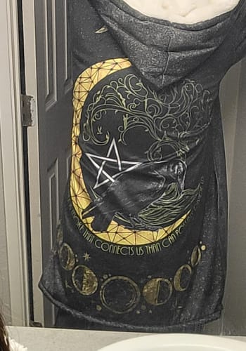 Customer photo review of 'There Is More That Connects Us' Premium Cloak