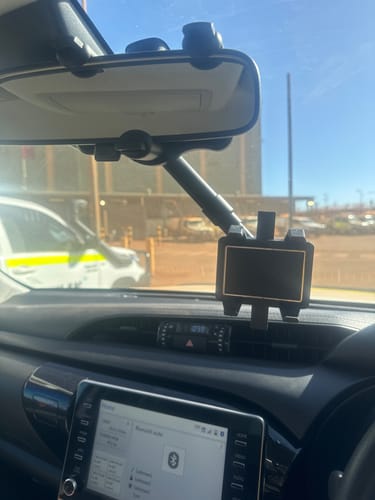 Customer photo review of 🤳🏽Multifunctional 360 Rotatable Car Rearview Mirror Phone Holder