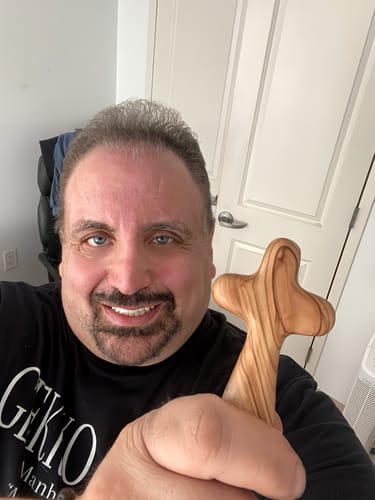 Customer photo review of Olive Wood Comfort Cross (Handheld)