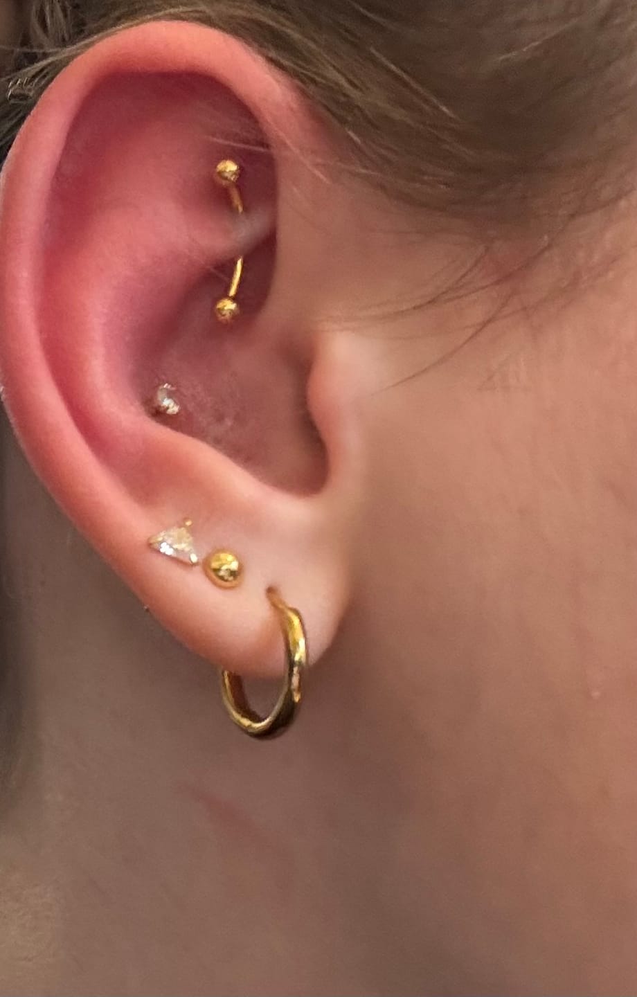 Customer photo review of Banana Rook Piercing Gold