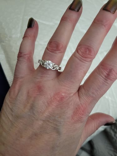 Customer photo review of Vintage Three Stone Moissanite Scrollwork Engagement Ring