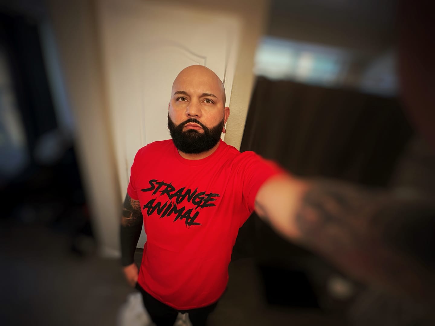 Customer photo review of Strange Animal T-Shirt