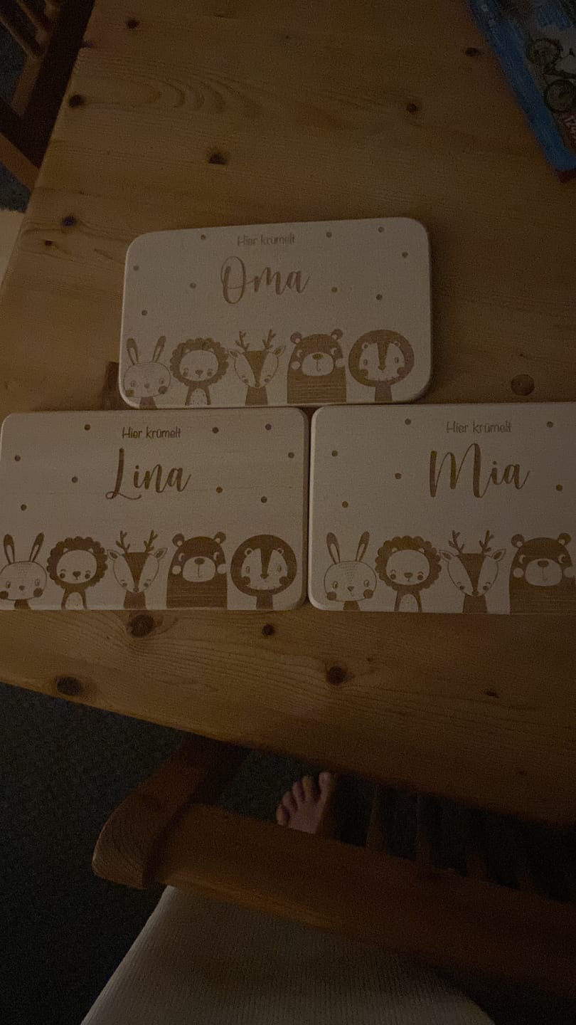 Customer photo review of Personalisiertes Frühstücksbrettchen Große Tierfamilie
