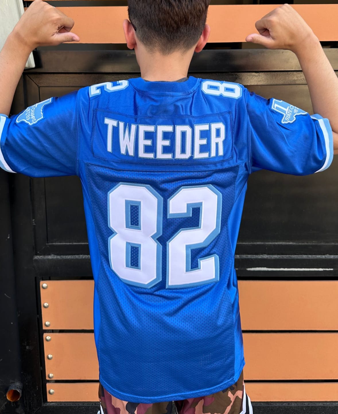 Customer photo review of Charlie Tweeder Varsity Blues West Canaan Coyotes Football Jersey