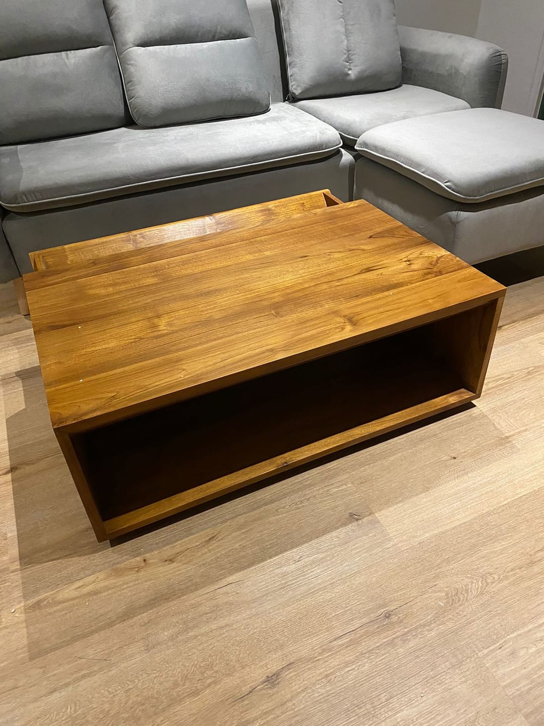 Customer photo review of Timeless Teak Coffee Table with Seamless Storage