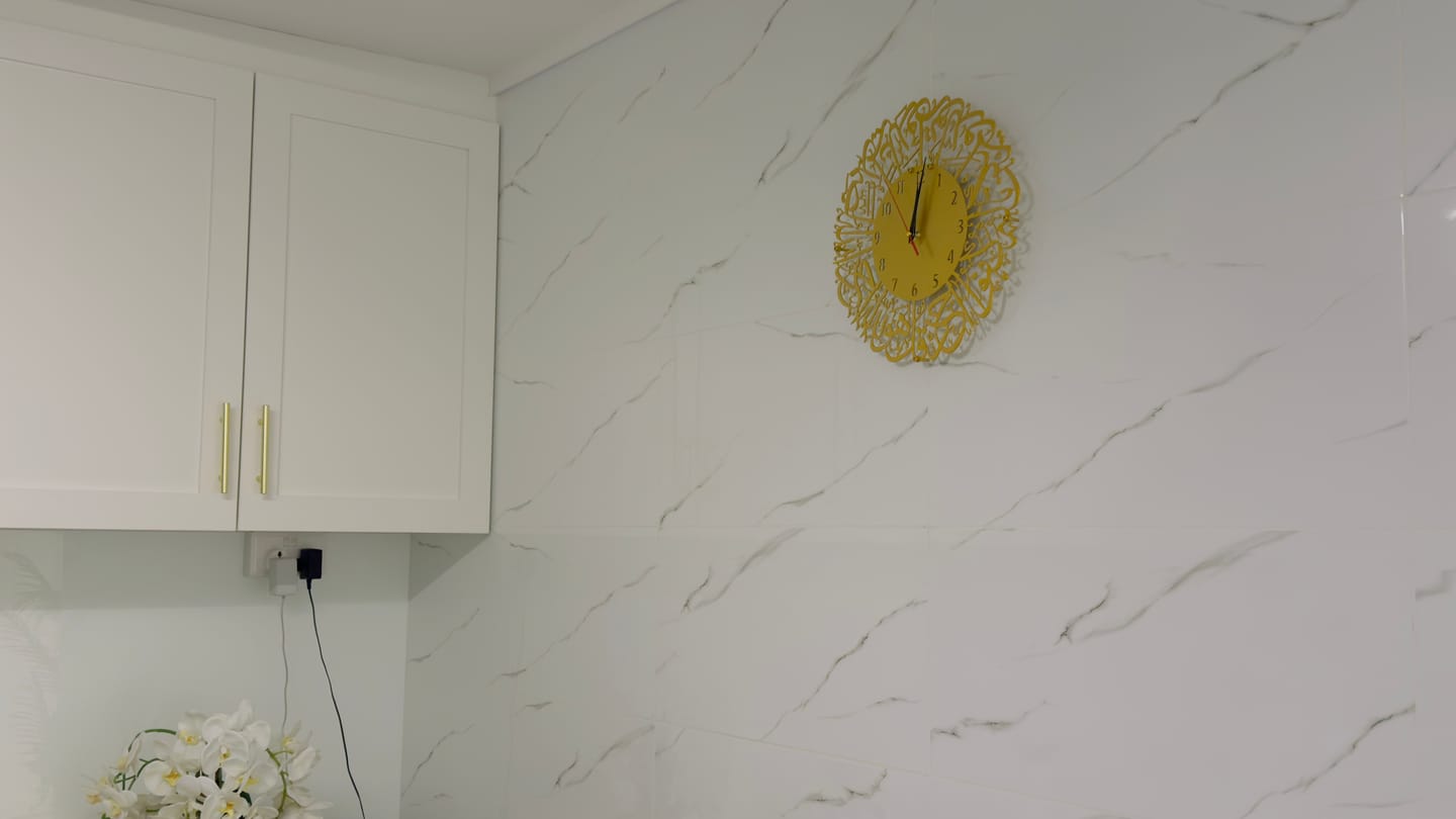 Customer photo review of Surah Al Ikhlas Metal Clock Islamic Wall Art - Gold
