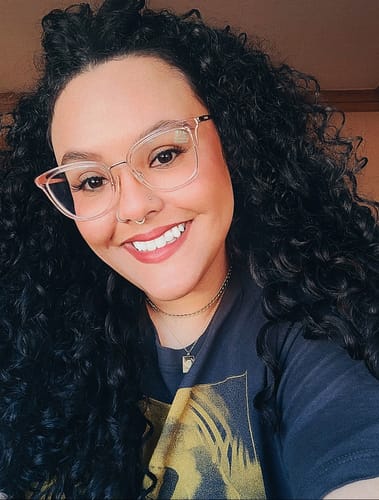 Customer photo review of Natural Black Curly Clip-In Hair Extensions