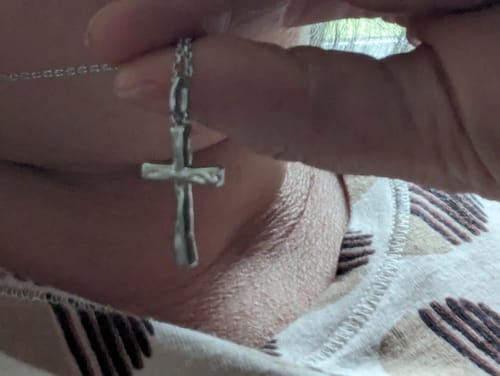 Customer photo review of Liquid Cross Necklace