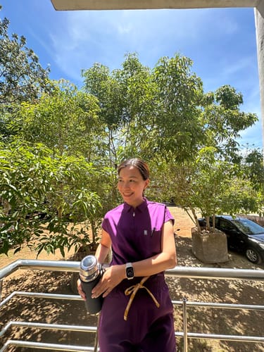 Customer photo review of Zip Up Polo MoveTech® Scrub Top 3.0 - Women / Plum