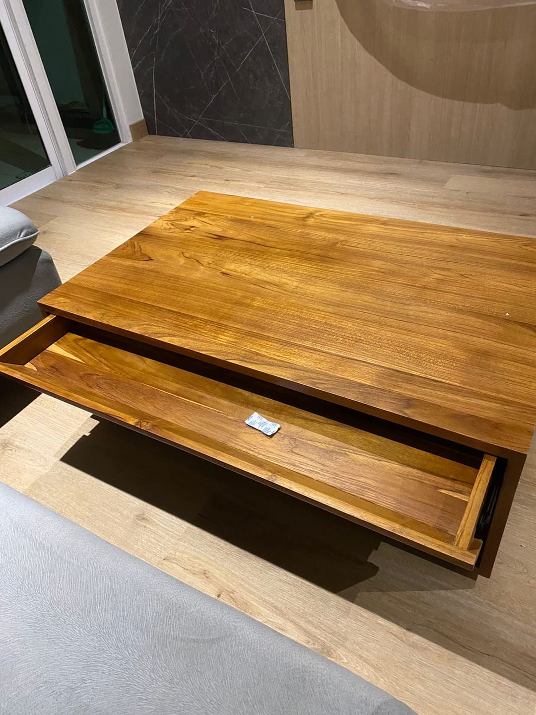 Customer photo review of Timeless Teak Coffee Table with Seamless Storage
