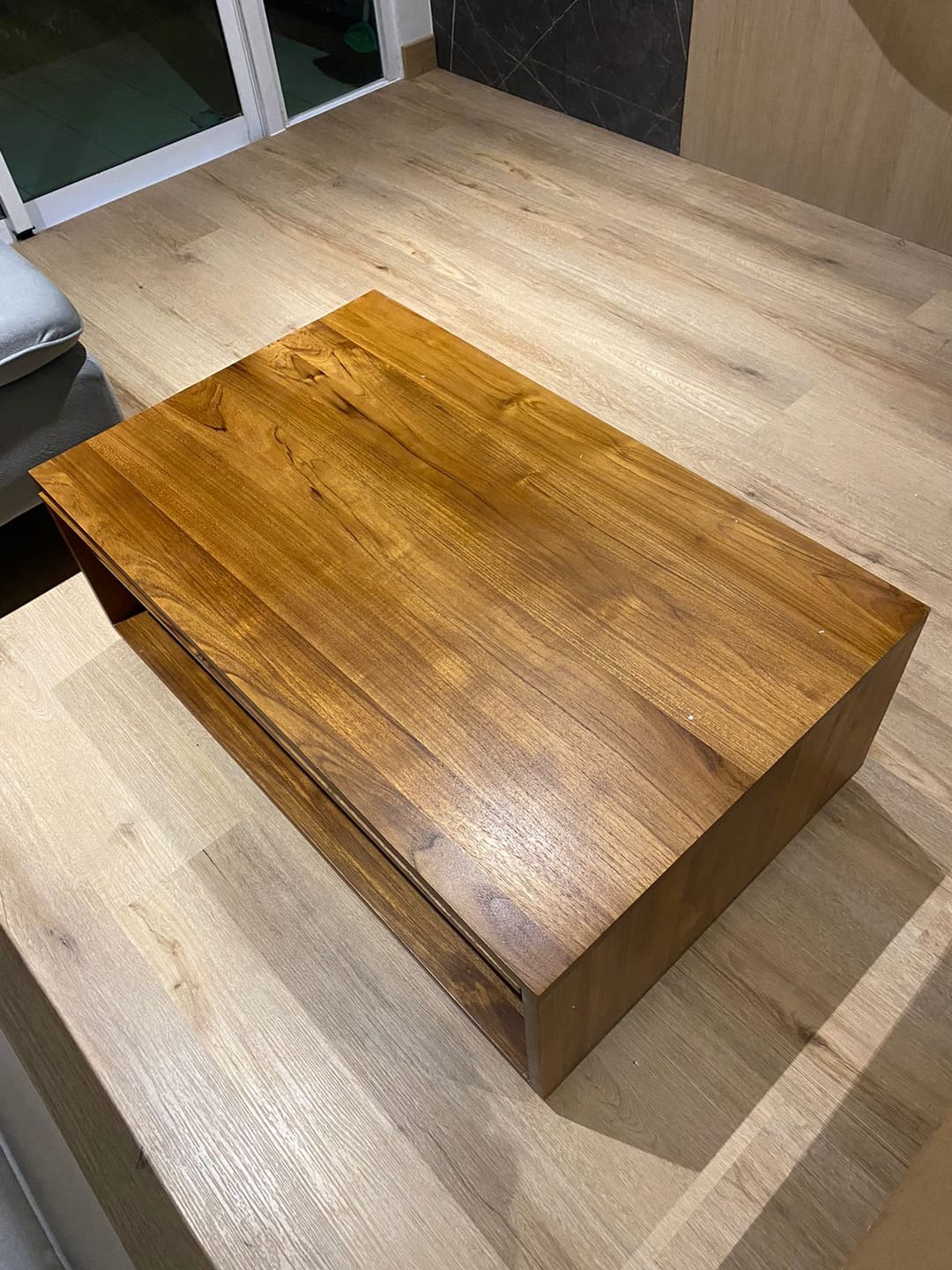 Customer photo review of Timeless Teak Coffee Table with Seamless Storage