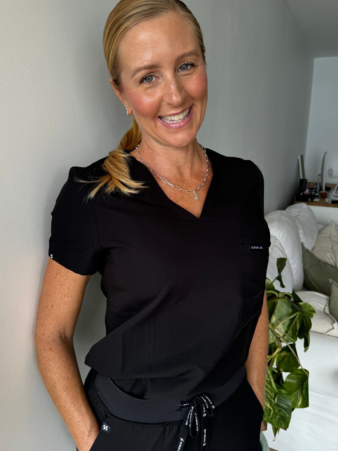 Customer photo review of FLORENCE Three Chest Pocket Scrub Top (Original SLTECH™ fabric) - Black