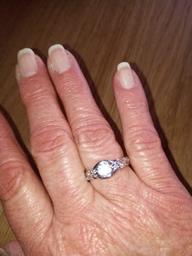 Customer photo review of Bezel Set Round Moissanite Scroll Accents Engagement Ring