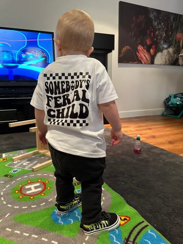 Customer photo review of Somebody's Feral Child Front & Back Graphic Tee