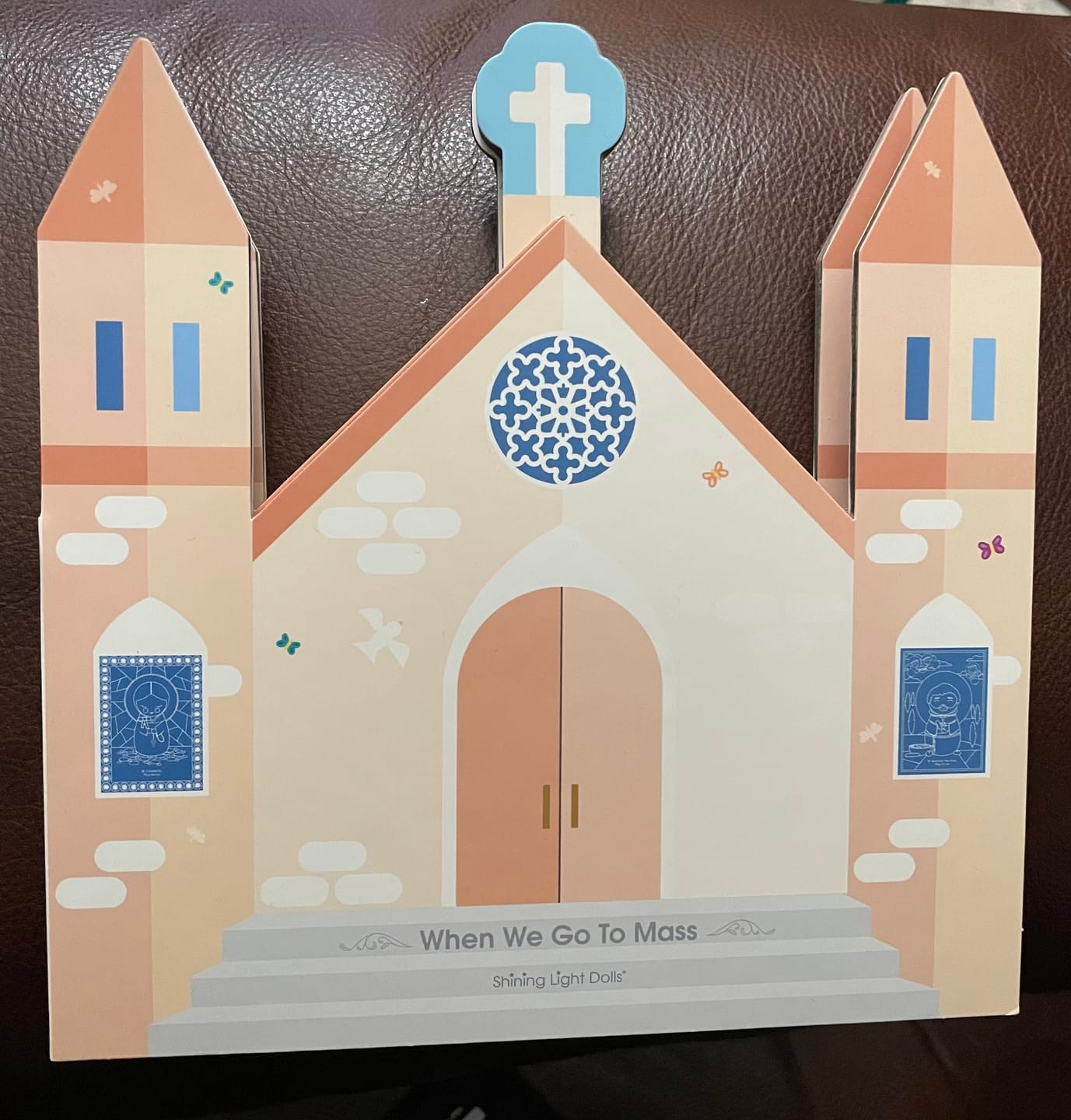 Customer photo review of When We Go to Mass - shaped board book
