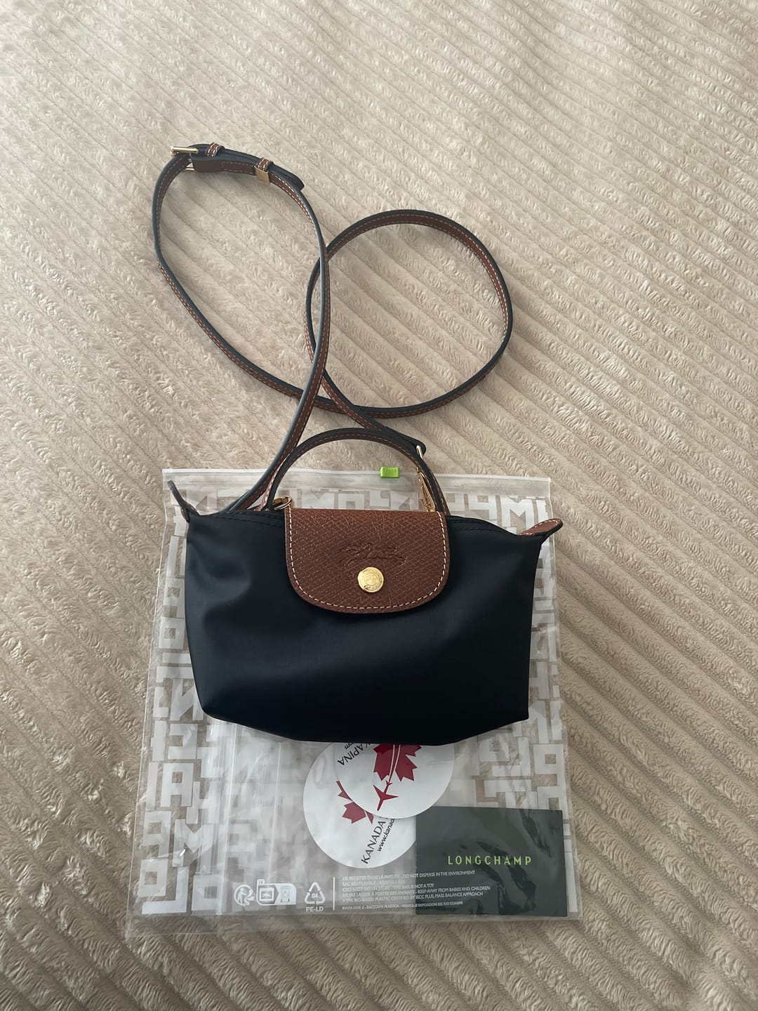 Customer photo review of Longchamp Le Pliage Original Mini Top Handle Black Pouch