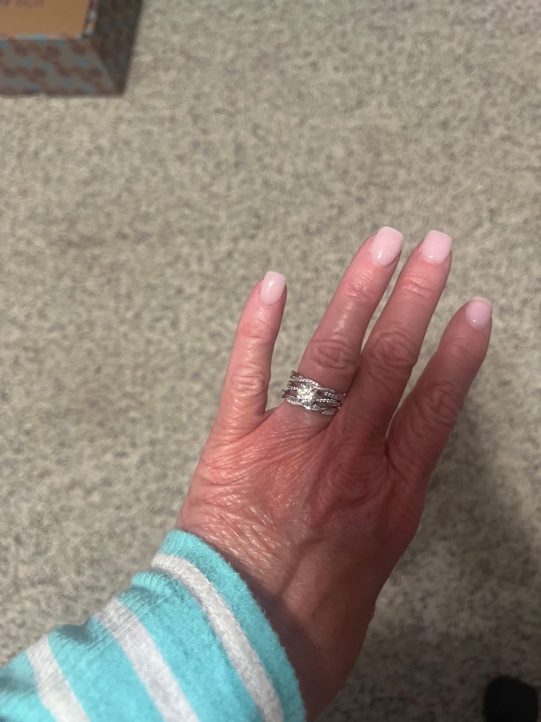 Customer photo review of Twisted Vine Moissanite Half Eternity Wedding Band Stackable Ring