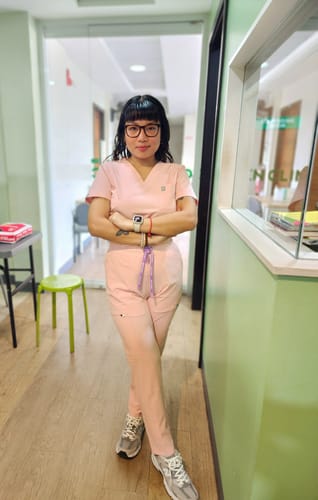 Customer photo review of 4-Pocket MoveTech® Scrub Top - Women / Taffy