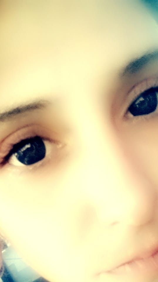 Customer photo review of Halloween Blackout Colored Contact Lenses