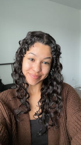 Customer photo review of Natural Black Spiral Clip-In Hair Extensions
