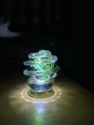 Customer photo review of Dichroic Ring Planet with Cremains