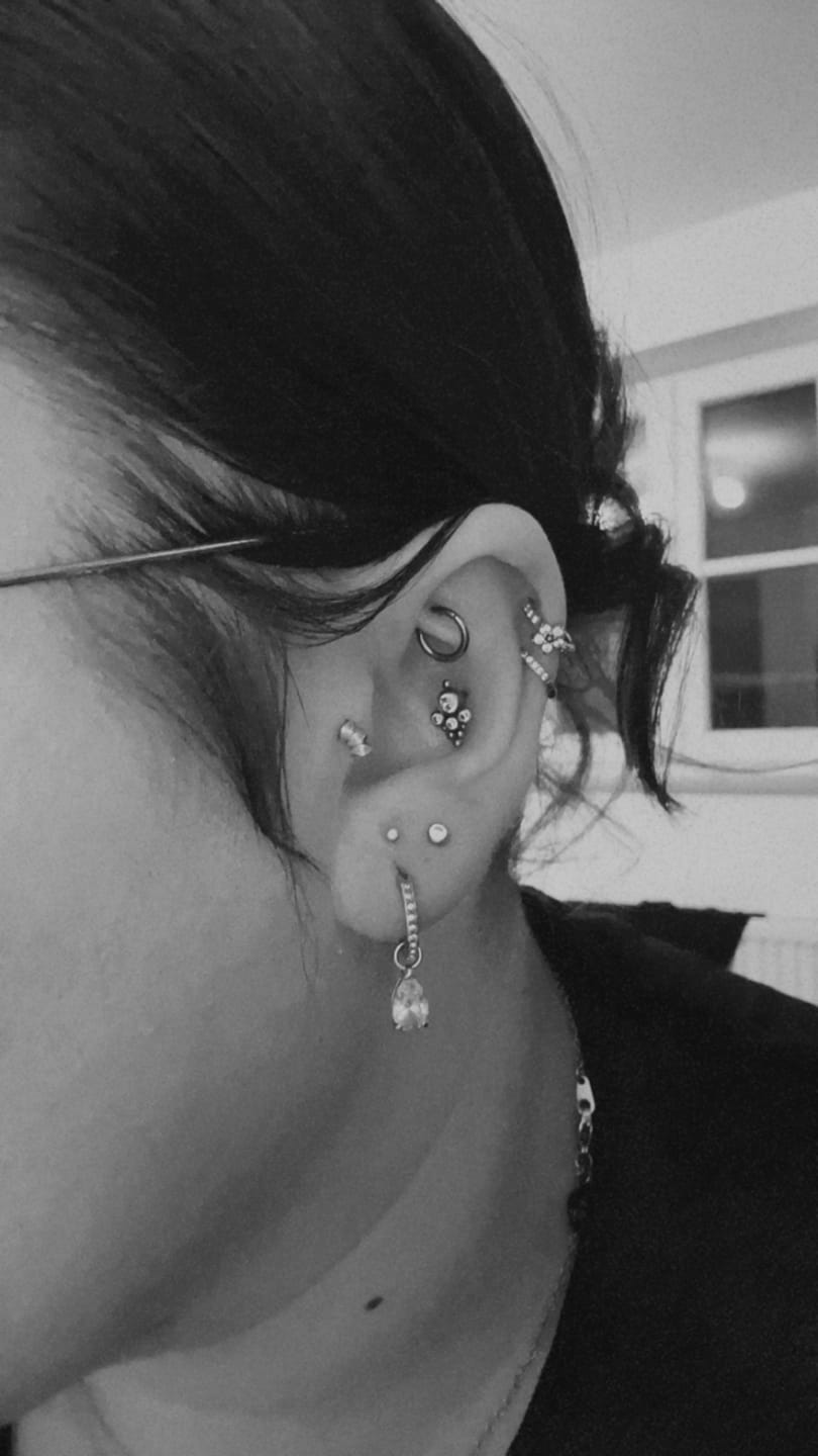 Customer photo review of Shining Point Piercing | Titan