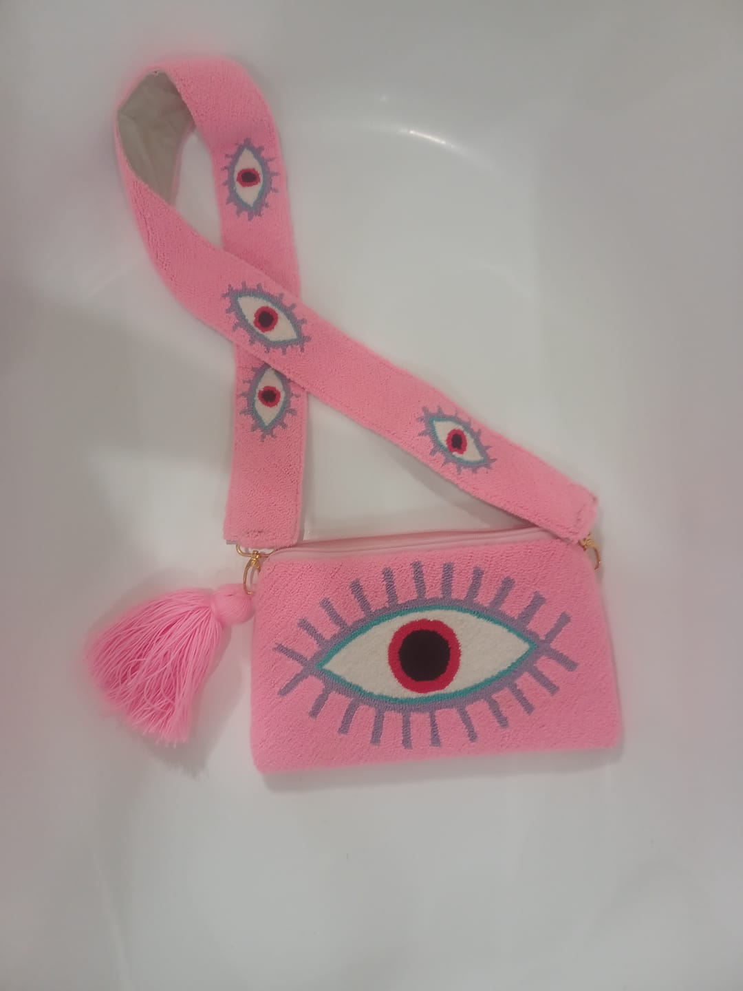 Customer photo review of Baby Pink Evil Eye Clutch