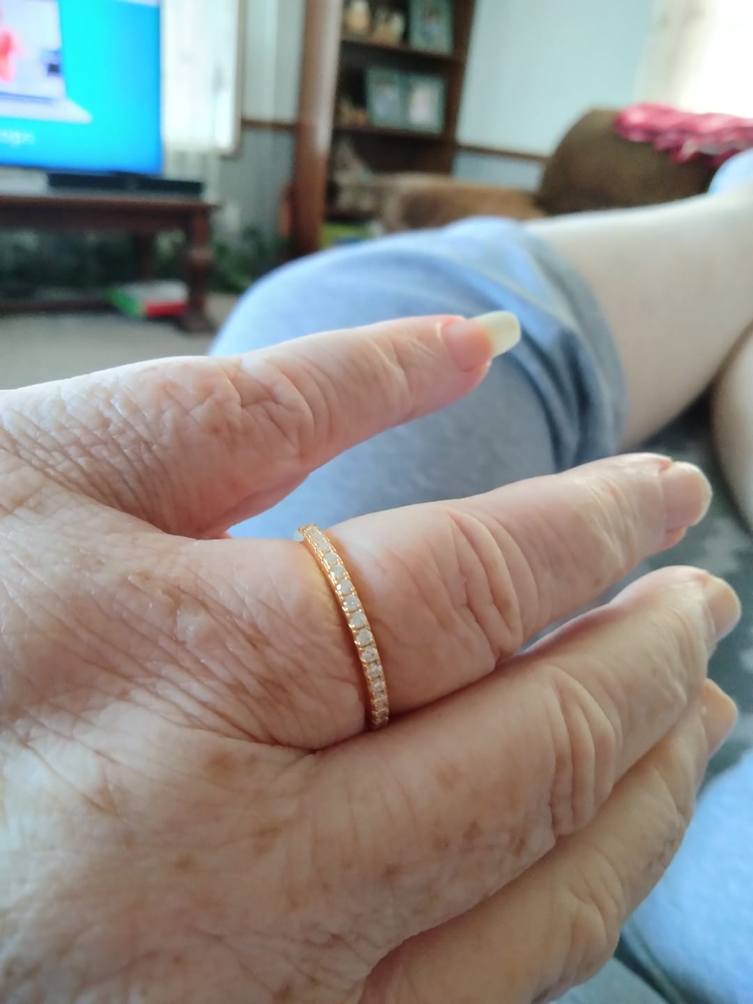 Customer photo review of Moissanite Round Half Eternity Sterling Silver Wedding Band Stackable Ring