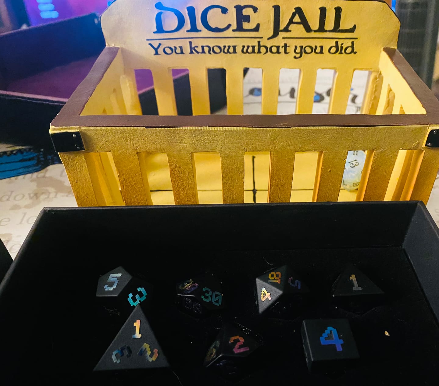 Customer photo review of URWizards Obsidian Raised Plating Number Dice Set Pixel Art RPG