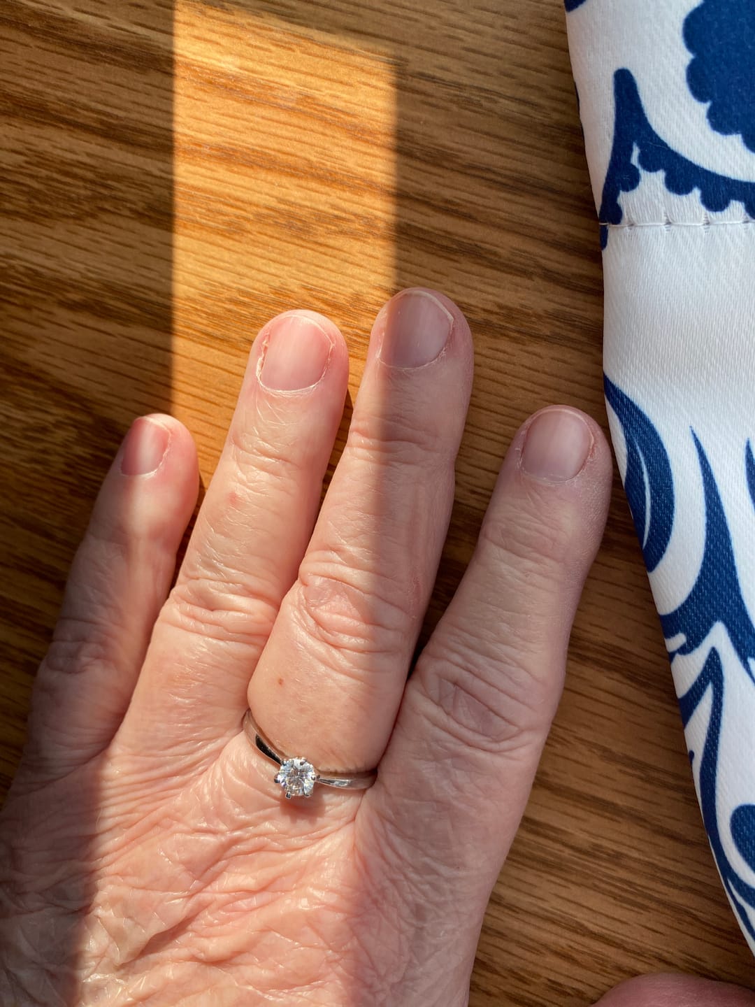 Customer photo review of Classic Solitaire Moissanite Six-Prong Sterling Silver Engagement Ring