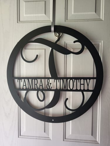 Customer photo review of Metal Initial Sign: Circle Split Initial Letter -  Metal Sign, Family Name Sign, Initial Wall Decor, Year Long Front Porch Name Sign