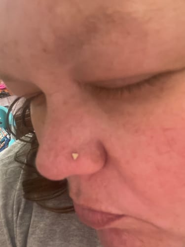 Customer photo review of Flat Triangle Top L-Bend Nose Ring