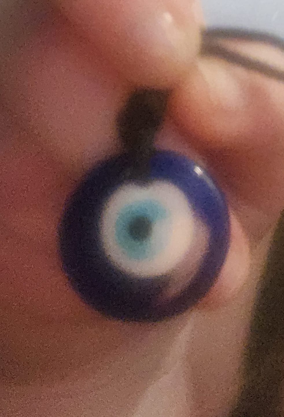 Customer photo review of Glass Evil Eye Good Luck and Protection Necklace