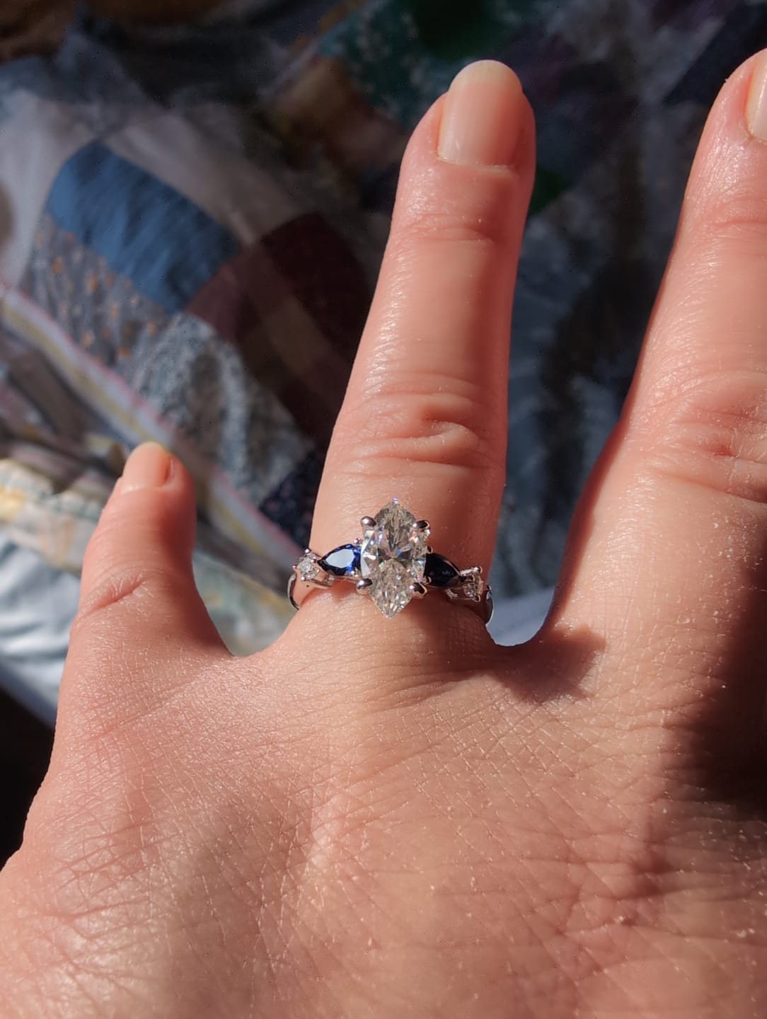 Customer photo review of Five Stone Moissanite And Sapphire Engagement Ring