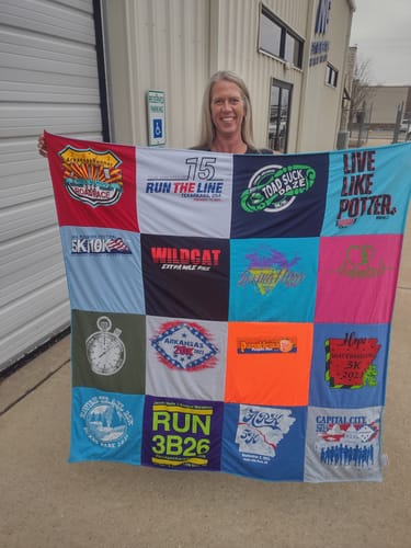 T-shirt quilt with running, community events themes by Rebecca from AR