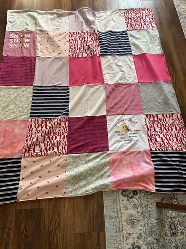T-shirt quilt with winter activities, family gatherings themes by Lisa from NC