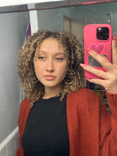 Customer photo review of Ash Blonde Ringlet Clip-In Hair Extensions