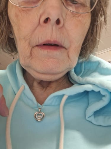 Customer photo review of Dancing Moissanite Double Heart Necklace in Sterling Silver
