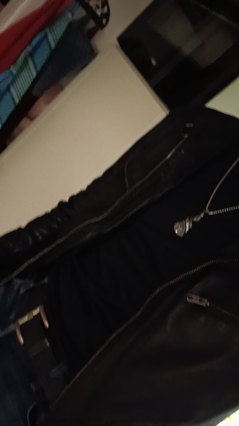 Customer photo review of THE SERPENT GUITAR. - NECKLACE