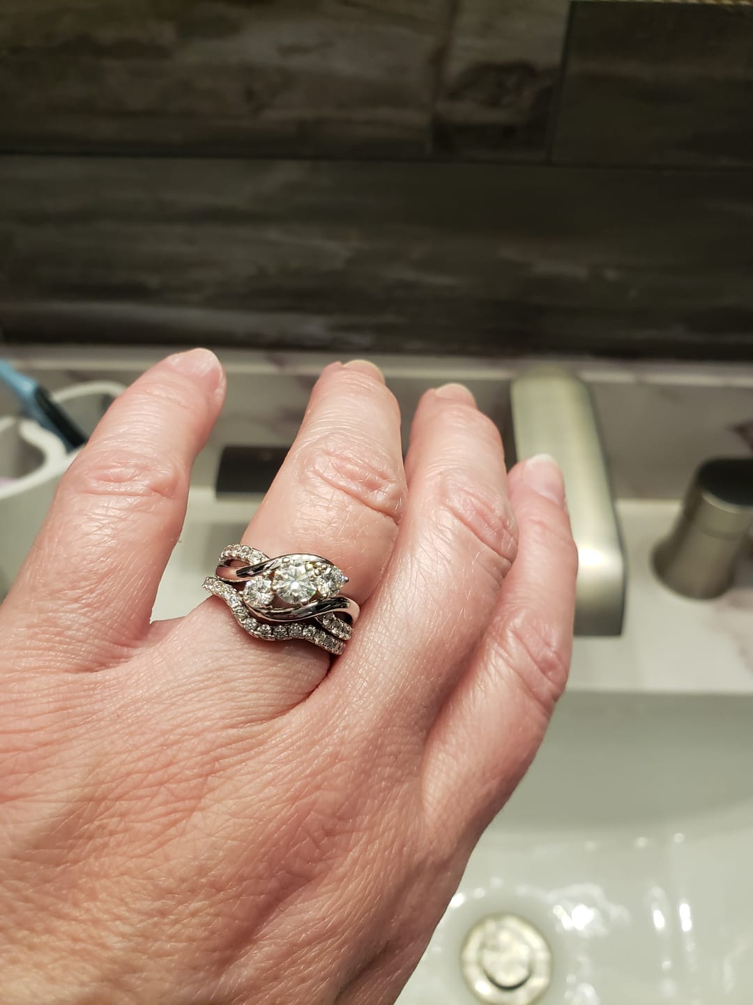 Customer photo review of Curved Pave Moissanite Half Eternity Wedding Band Stackable Ring