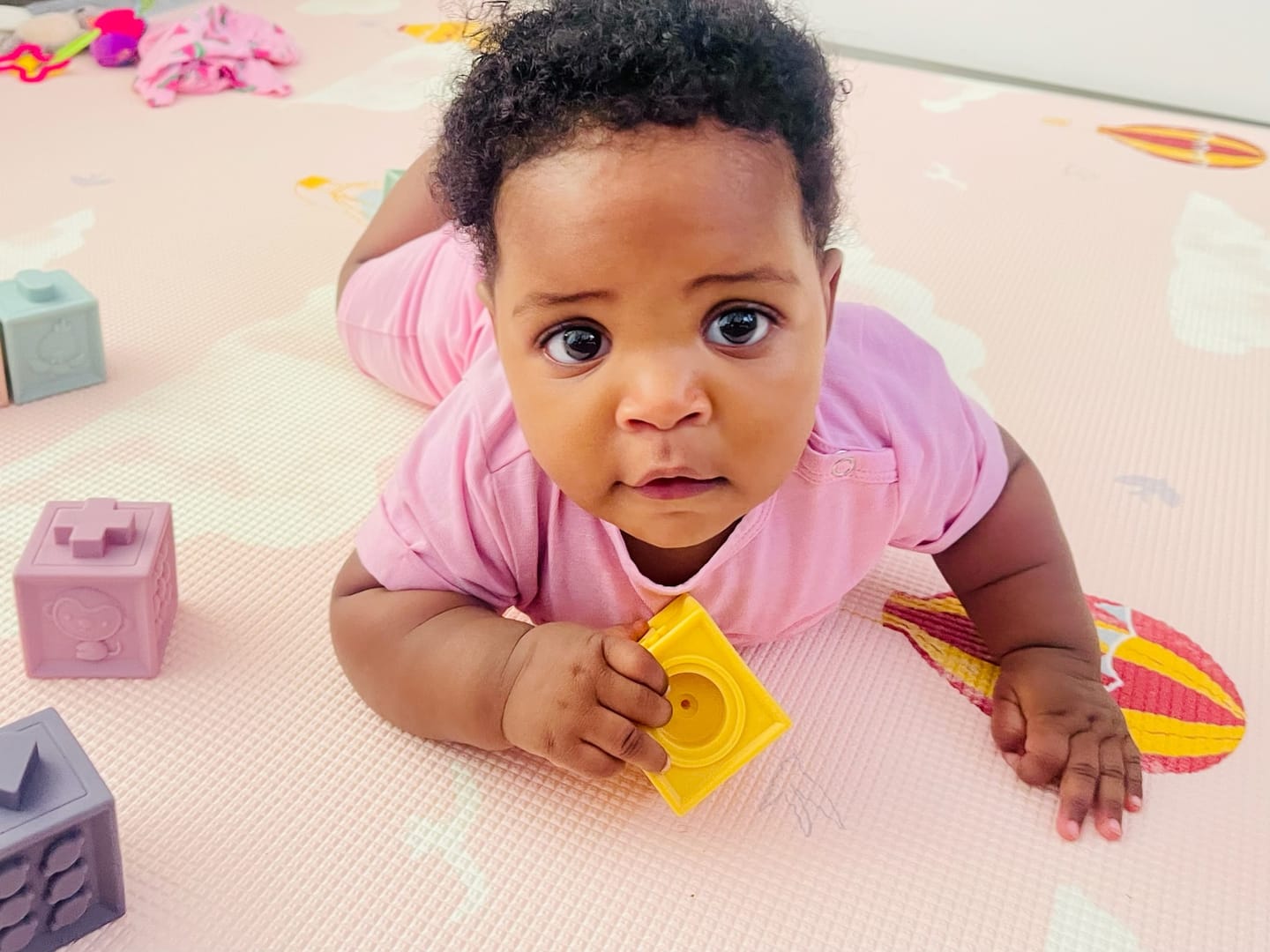 Customer photo review of Sunset Geo/ In The Clouds Pink Play Mat