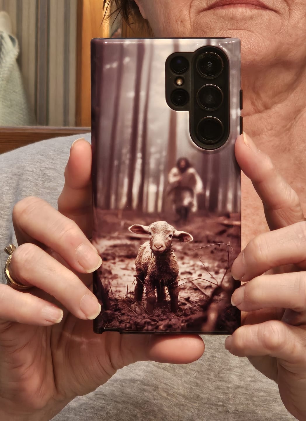 Customer photo review of Jesus With The Sheep, Jesus Running After Lamb, Phone Case