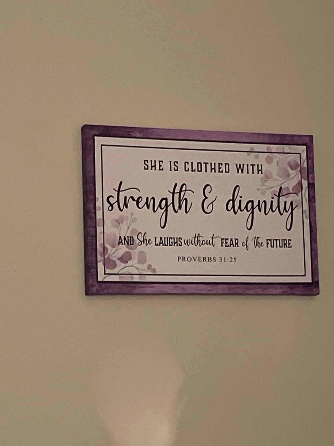 Customer photo review of Proverbs 31:25 wall art: She is clothed with strength & dignity wall art canvas