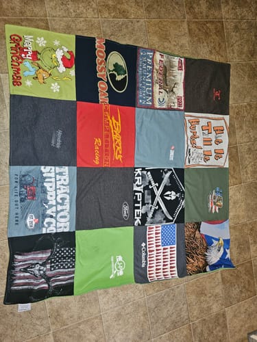 T-shirt quilt with hunting, fishing themes by Ciara from NC