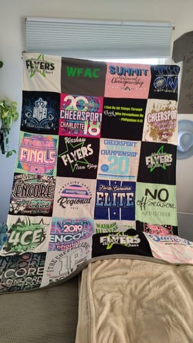 T-shirt quilt with cheerleading, sports themes by Sarah from NC