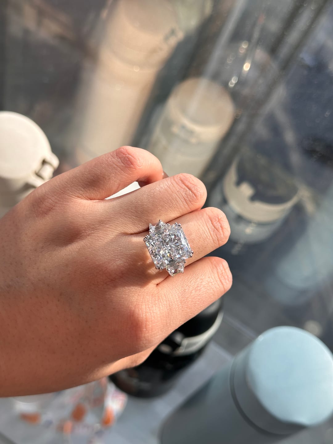 Customer photo review of S925 6.5/12.0 Ct Radiant Cut Crushed Ice Simulated Diamond Three-Stone Engagement Travel Ring