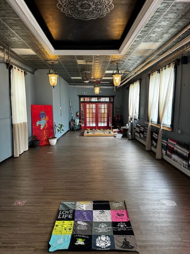 T-shirt quilt with yoga, meditation themes by Melissa from NJ