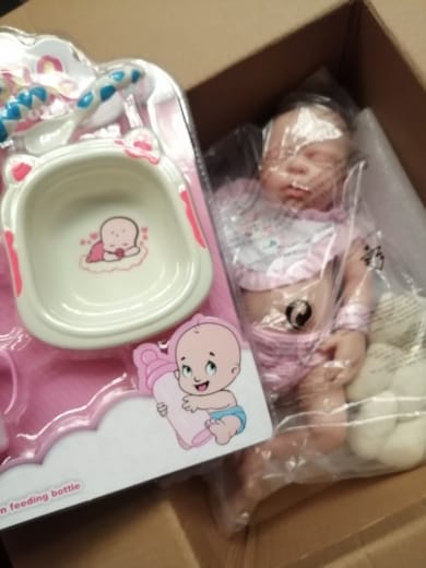 Customer photo review of Prematura reborn femmina addormentata bocca aperta 32cm / 1.1kg 100% silicone morbido - NOVA
