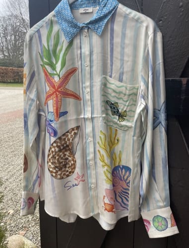 Customer photo review of Dream Ocean Satin Unique Print Button Down Pocket Oversized Blouse